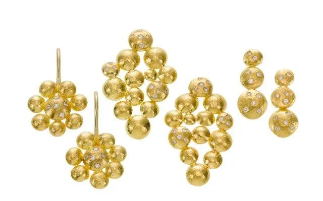 earrings / gold hammered 22k  graduated discs   diamonds